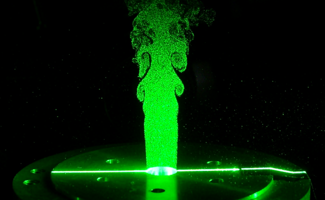 Free jet illuminated by laser