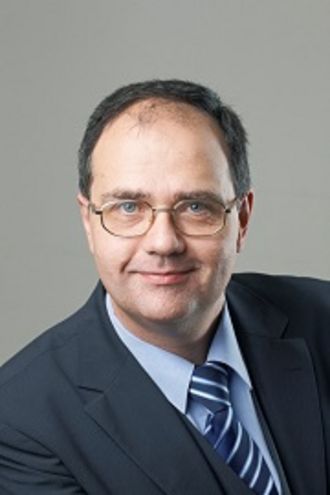 Portraitfoto von Dipl.-Ing. Dr. Karl Grün