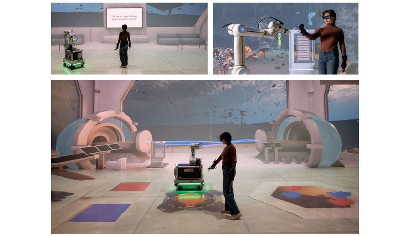 Research Game 3 mit dem physischen Roboter CHIMERA in der projizierten Spielumgebung im Deep Space 8K des Ars Electronica Centers